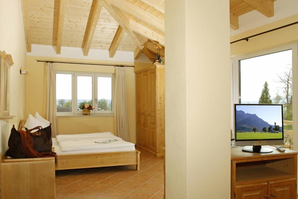 Hotel Garni Mowe Тутцинг Номер фото