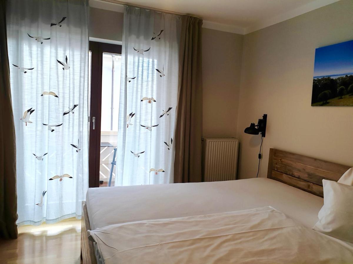 Hotel Garni Mowe Тутцинг Экстерьер фото